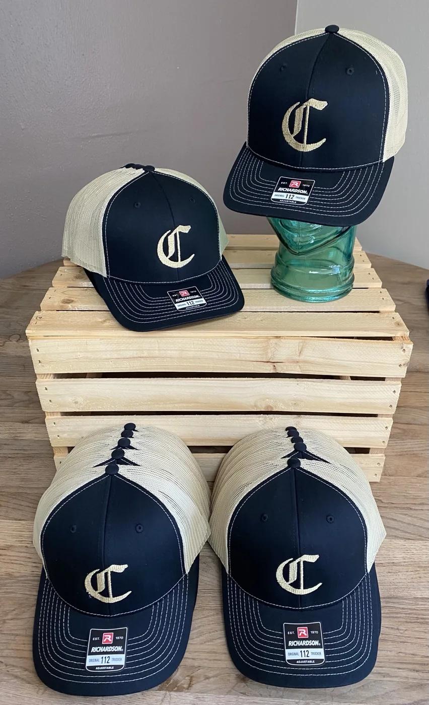 Navy and cream Cherokee C logo embroidered trucker caps