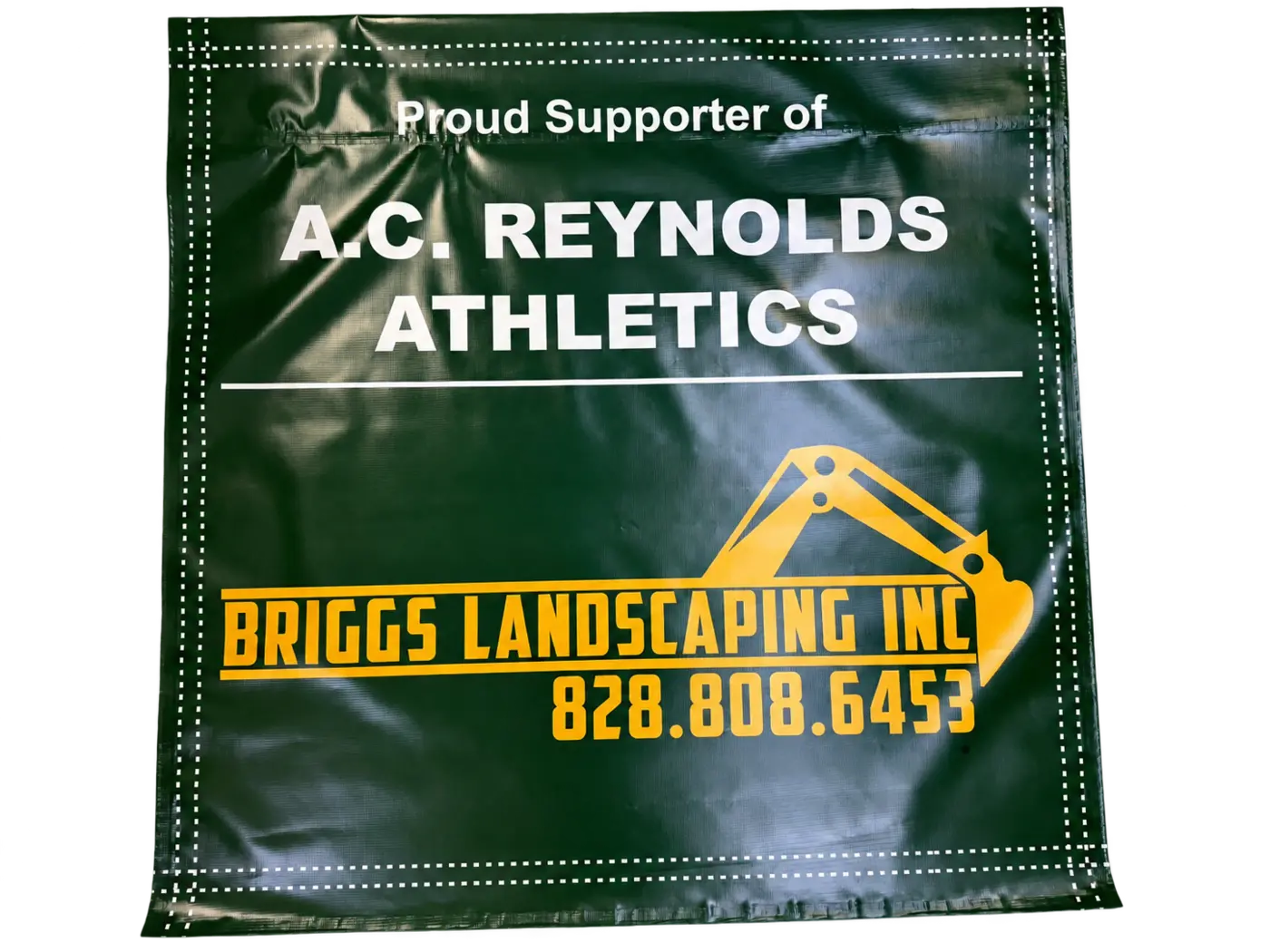 A.C. Reynolds Athletics hanging gym banner with pole pockets and Briggs Landscaping sponsorship
