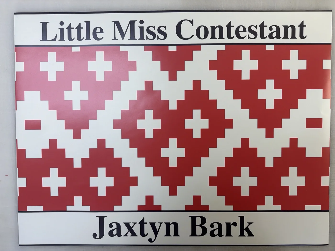 Little Miss Contestant magnet for Jaxtyn Bark with red and cream patterned design