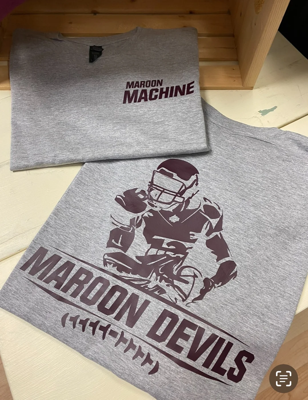 Gray Maroon Devils printed shirts with football artwork