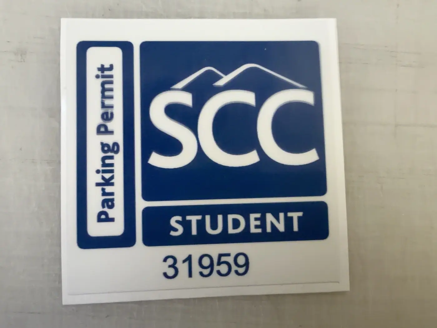 SCC student parking permit decal with a printed permit number