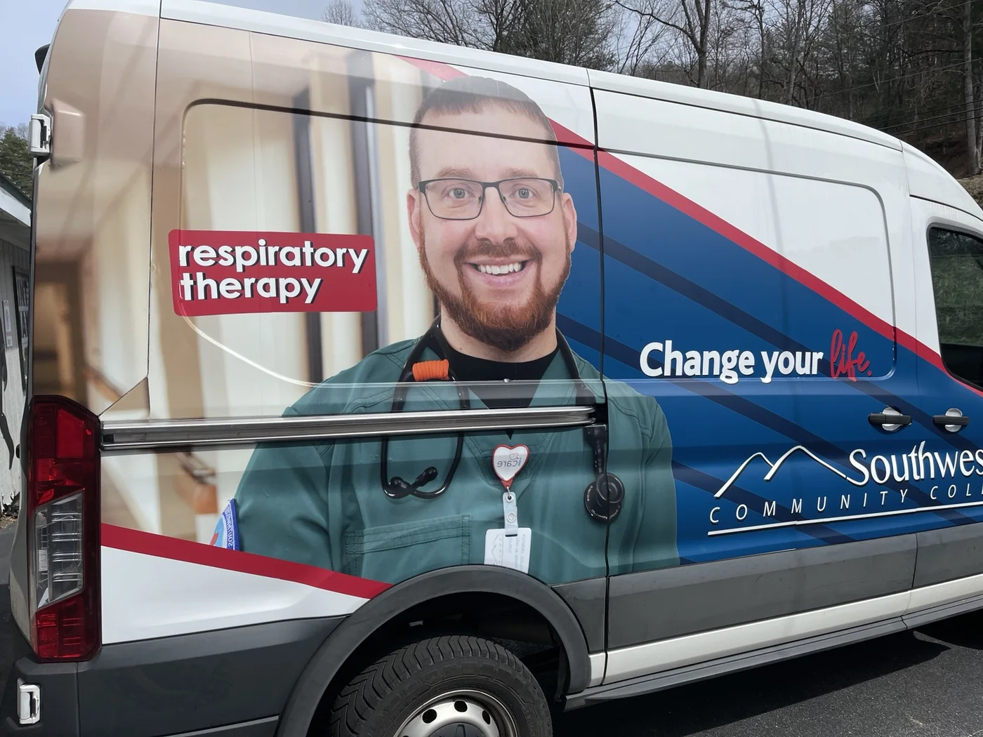 Southwestern Community College respiratory therapy van with large photographic graphics