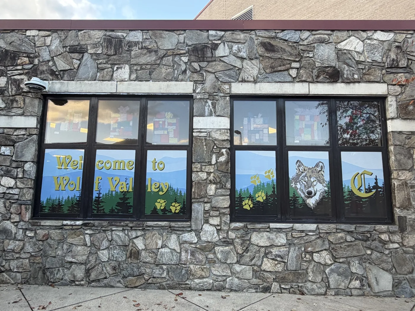 Installed Wolf Valley school window graphics across six windows